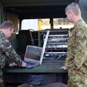 Two solders act like working in Fort Gordon Garrison Command