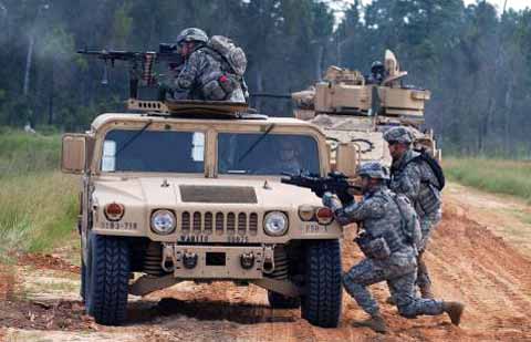 Fort Stewart Base Hummer Fort Stewart Base - Soldiers hiding behind Hummer