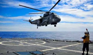 Helicopter lands on boat near Naval Weapons Station Seal Beach