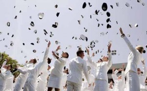 US coast guard academy graduates dressed white