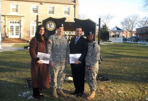 Fort Hamilton soldiers in front of sing