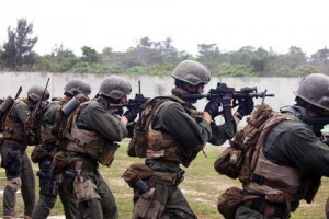 Soldiers practice at Camp Hansen