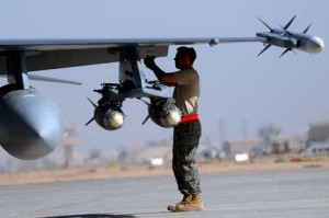Soldier repair plane at Joint Base Balad
