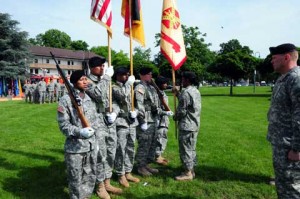 USAG Heidelberg Soldiers with flags