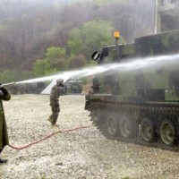Soldiers washing tank at Camp Hovey in South Korea
