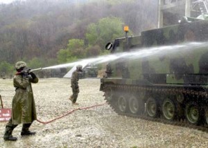 Soldiers washing tank at Camp Hovey in South Korea